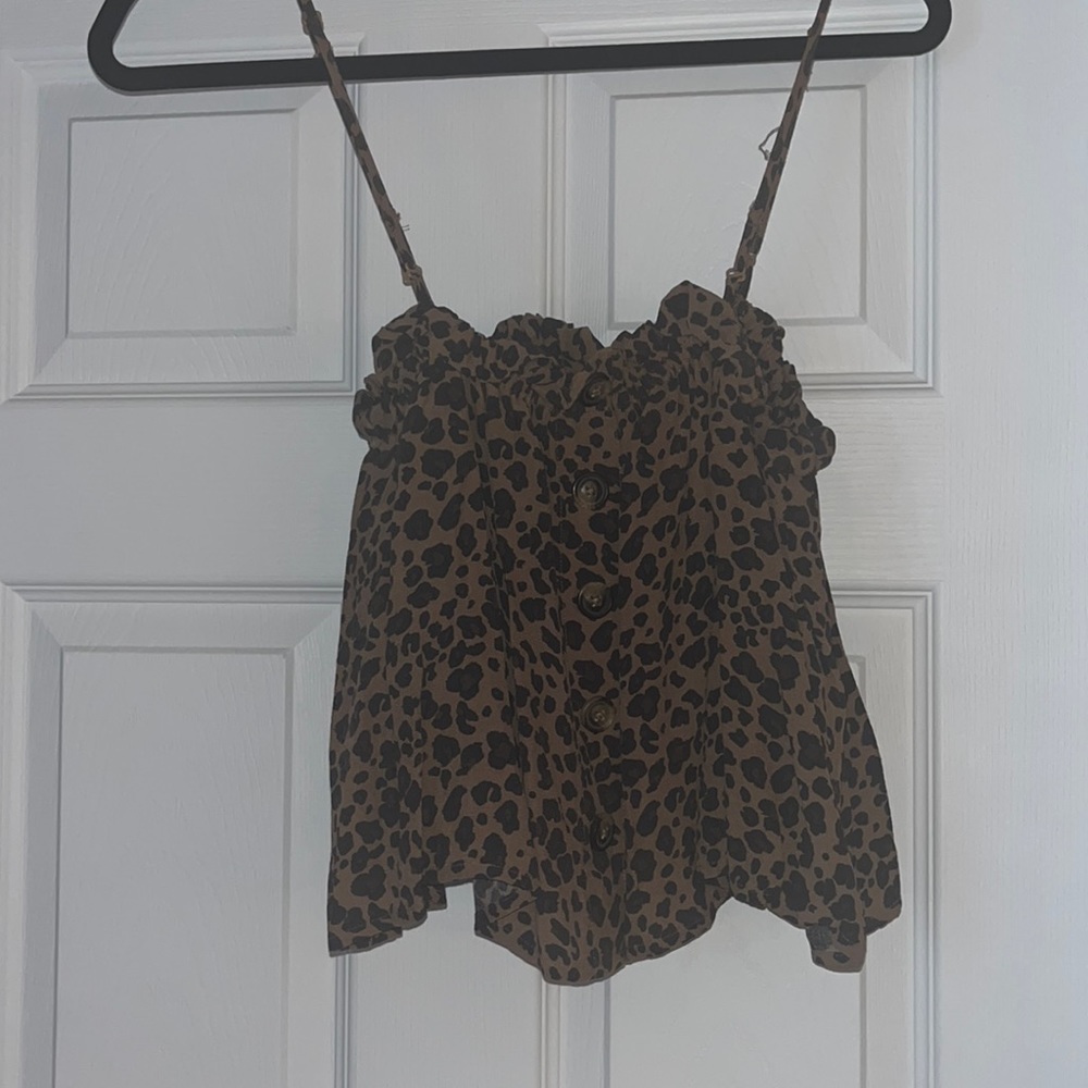 Brown leopard print tank top with brown accent buttons